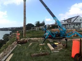 Installation of retaining wall poles